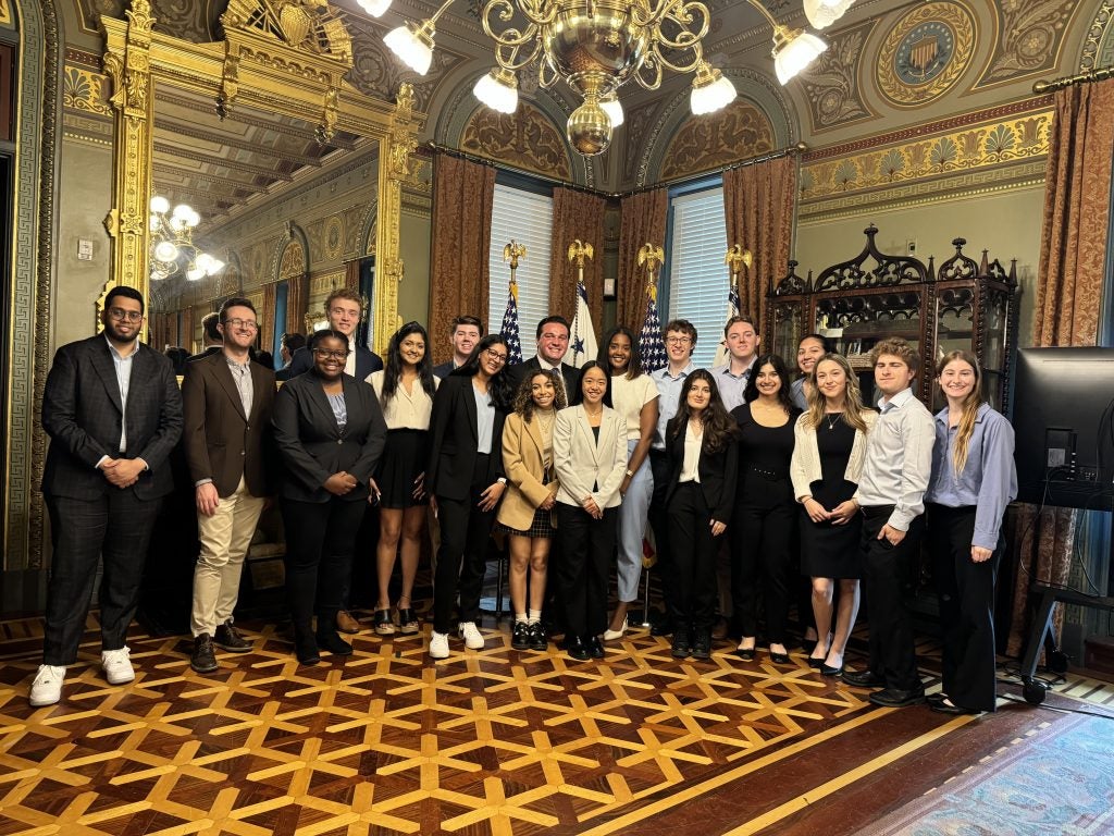 Students in ornate room in Vice President's Ceremonial Office.