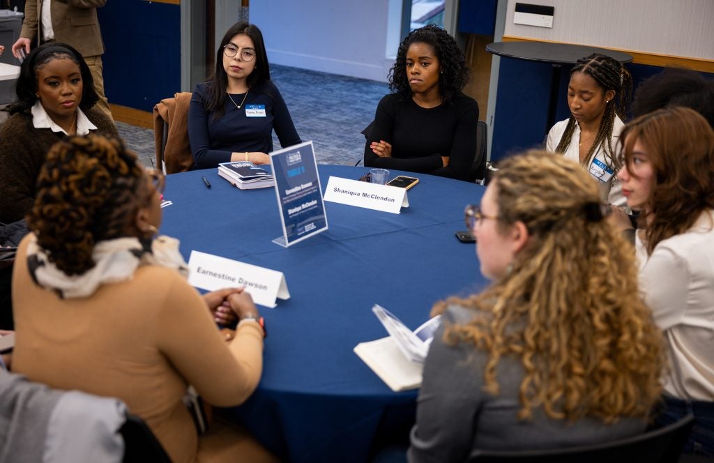 Students and professionals at a roundtable at the Women in Politics and Public Service Networking Event.