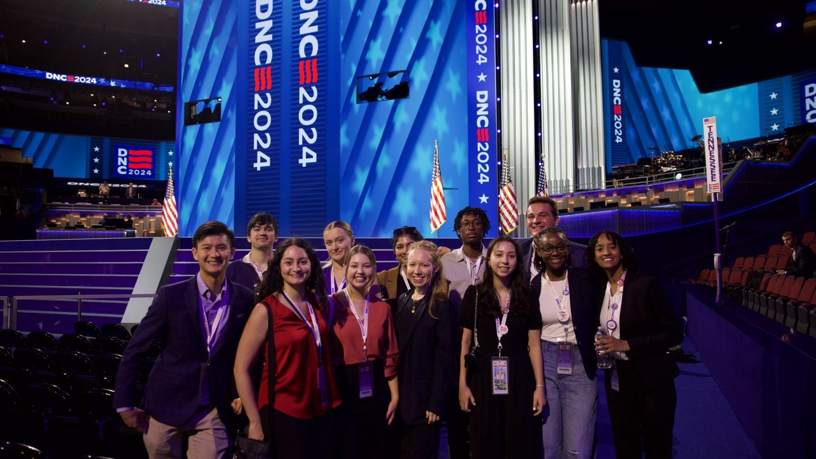 Students posing on floor of DNC Convention