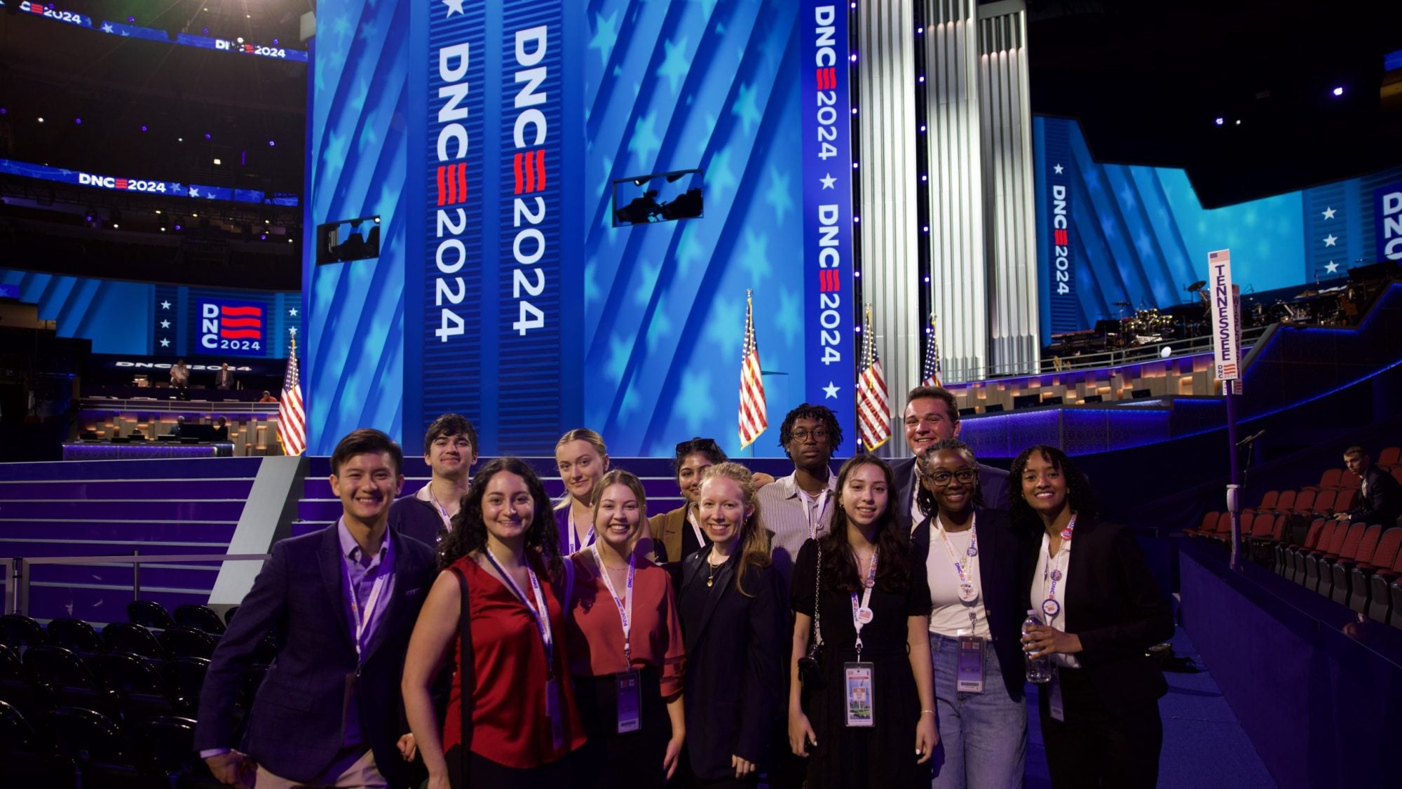 Students posing on floor of DNC Convention