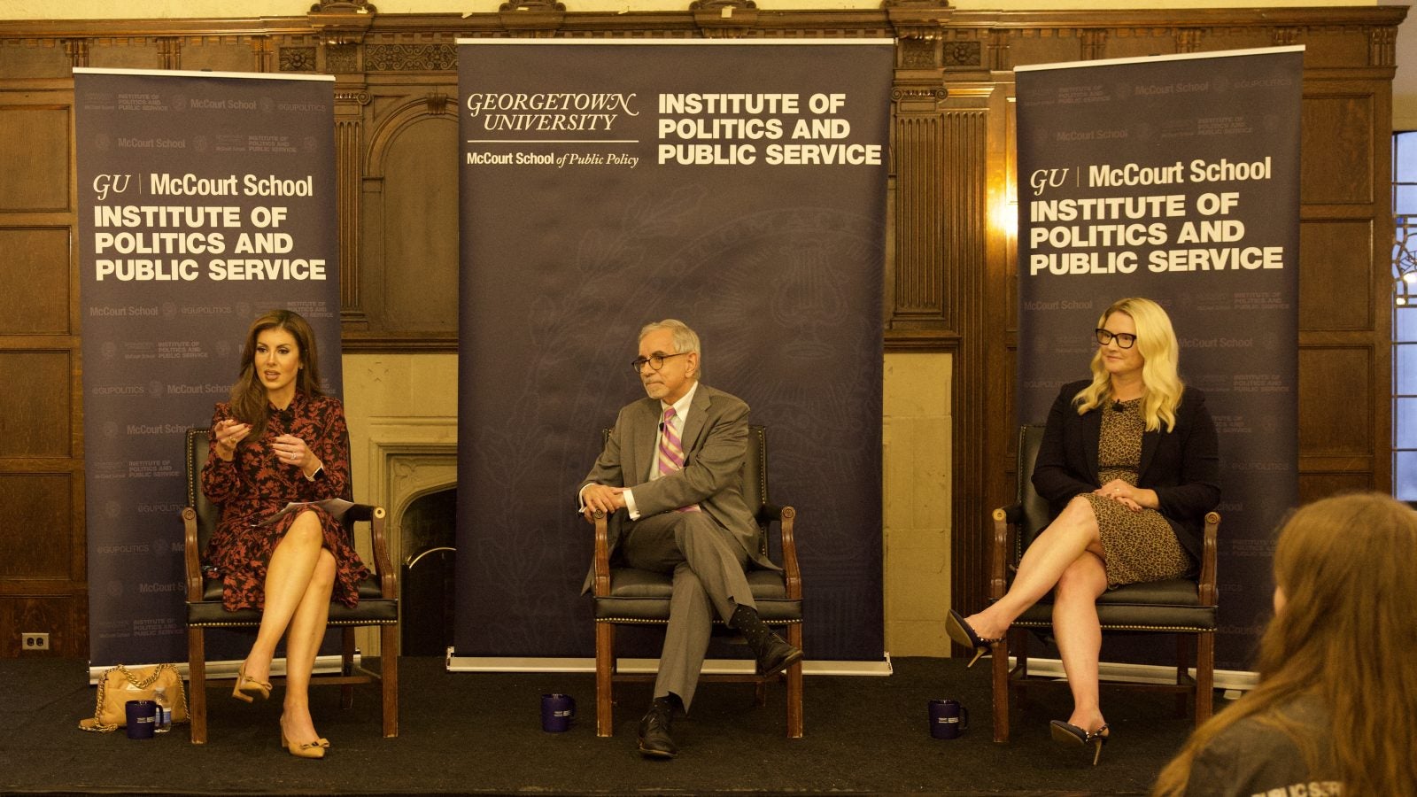 Morgan Ortagus, Tony Arend and Marie Harf seated on stage