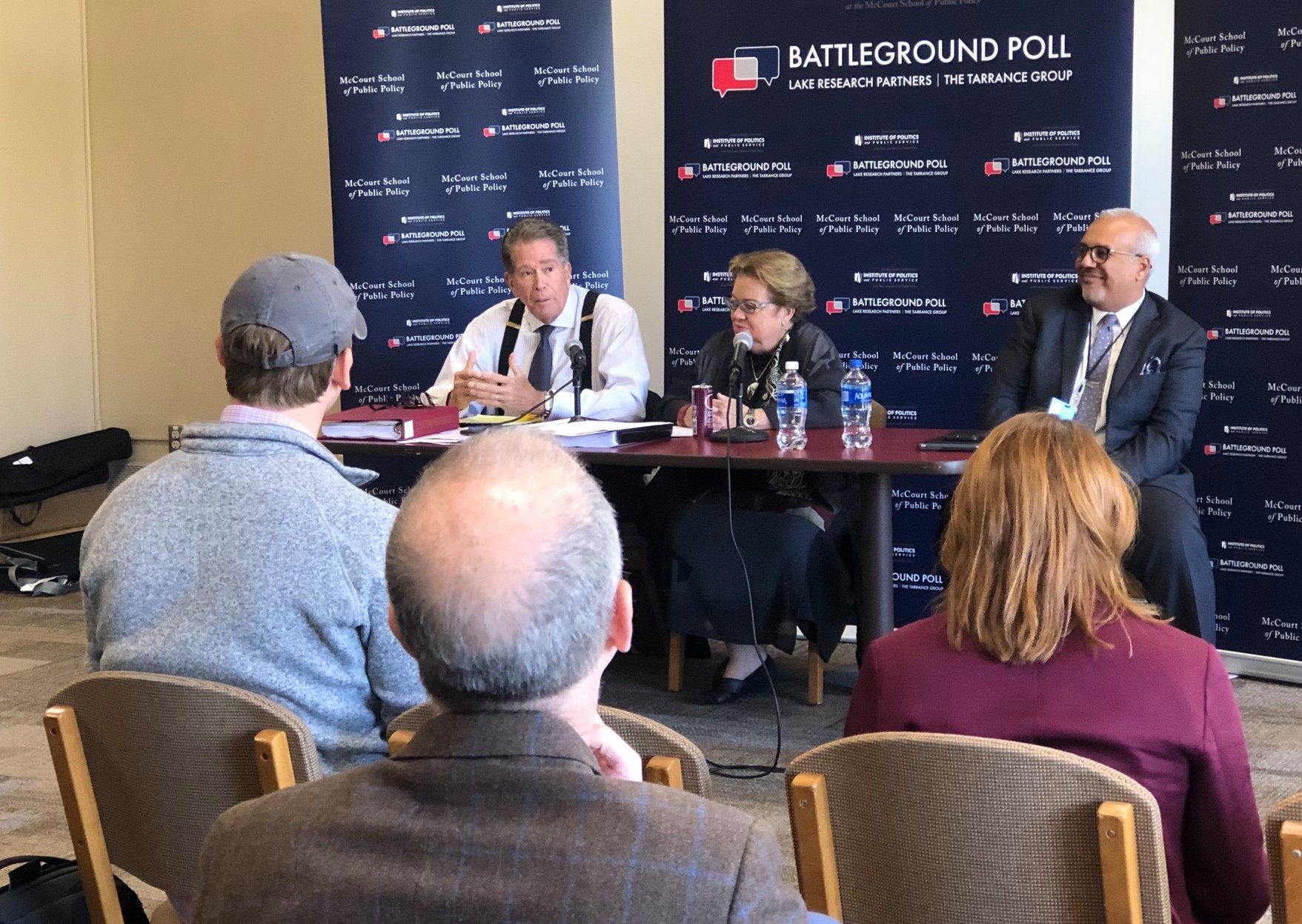 Ed Goeas, Celinda Lake and Mo Elleithee speaking at an event.