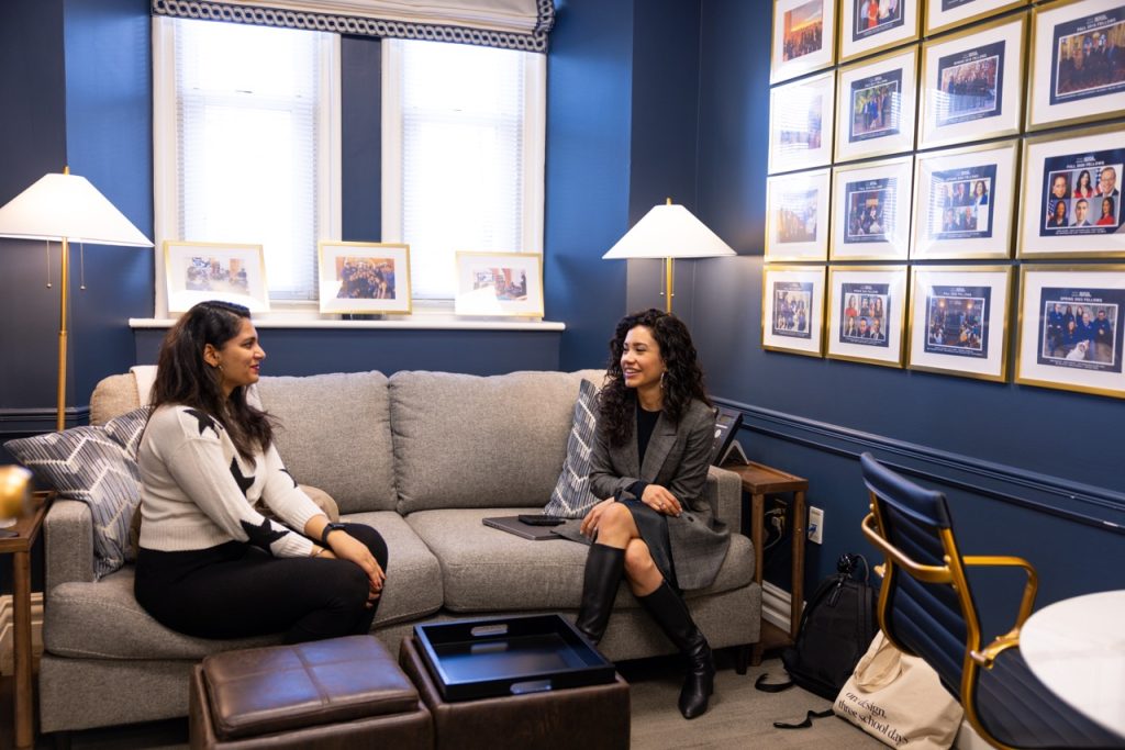 Fellow Laura Barrón-López with a student hosting office hours in the Fellows lounge.