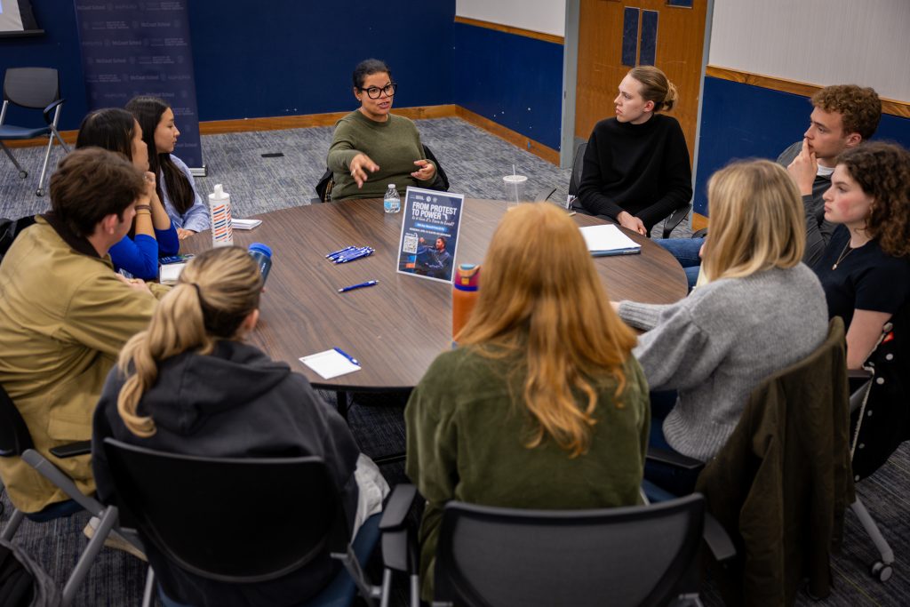 Roundtable of students speaking with Rebecca Pearcey.
