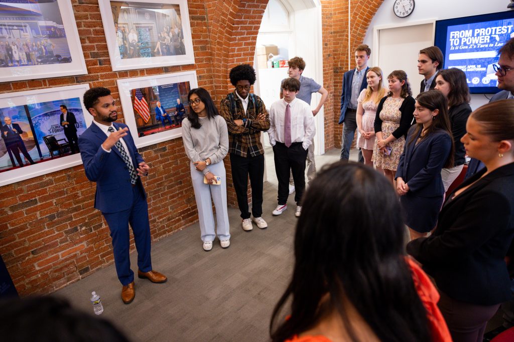 Frost speaks to students in the Living Room